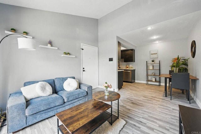 10296 Black Mountain Rd Unit 222, San Diego, CA 92126 - living area with light wood-style floors and baseboards