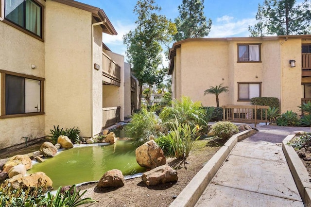 10296 Black Mountain Rd Unit 222, San Diego, CA 92126 - surrounding community with a garden pond