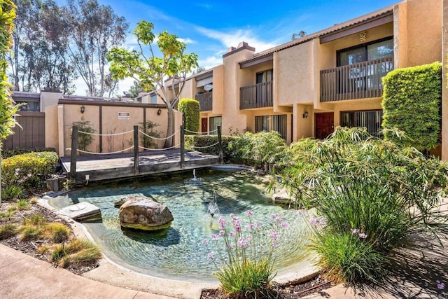 10296 Black Mountain Rd Unit 222, San Diego, CA 92126 - view of home's community with a small pond
