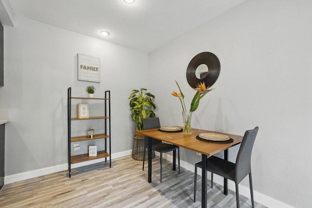 10296 Black Mountain Rd Unit 222, San Diego, CA 92126 - dining room featuring light wood-style flooring and baseboards