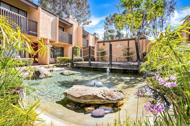 10296 Black Mountain Rd Unit 222, San Diego, CA 92126 - view of community with a small pond