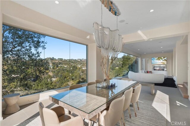 9716 Oak Pass Rd, Beverly Hills, CA 90210 - tiled dining room with recessed lighting