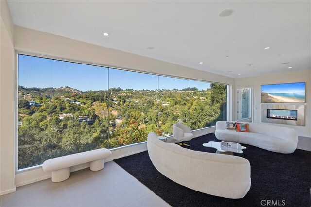9716 Oak Pass Rd, Beverly Hills, CA 90210 - tiled living room with recessed lighting