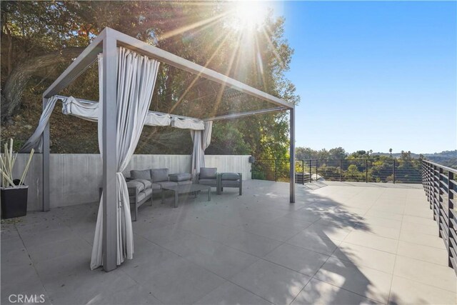 9716 Oak Pass Rd, Beverly Hills, CA 90210 - view of patio featuring an outdoor hangout area