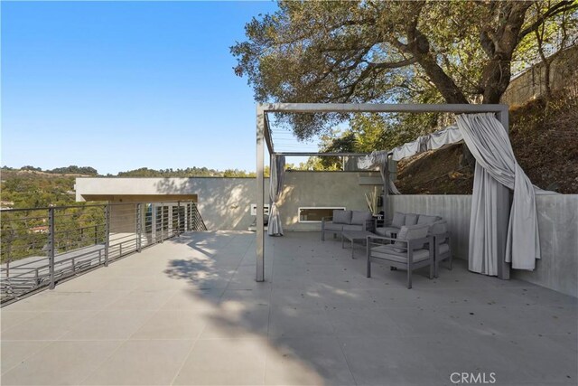 9716 Oak Pass Rd, Beverly Hills, CA 90210 - view of patio / terrace featuring an outdoor living space