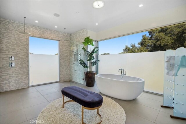 9716 Oak Pass Rd, Beverly Hills, CA 90210 - bathroom featuring a soaking tub, walk in shower, tile patterned floors, and recessed lighting