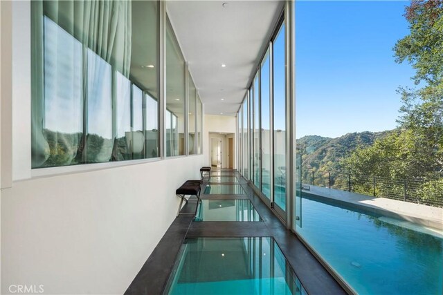 9716 Oak Pass Rd, Beverly Hills, CA 90210 - indoor pool featuring a mountain view