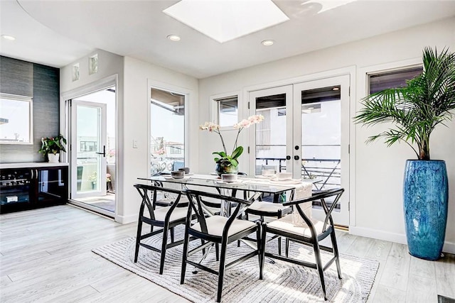 417 23rd St, Manhattan Beach, CA 90266 - dining room featuring french doors, baseboards, plenty of natural light, light wood-type flooring, and recessed lighting