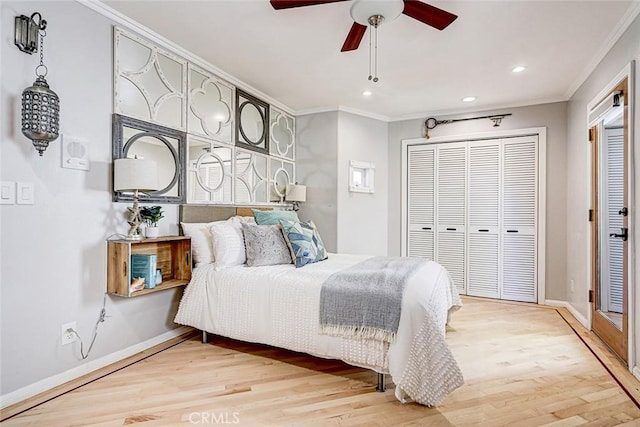 417 23rd St, Manhattan Beach, CA 90266 - bedroom with crown molding, light wood-type flooring, a closet, baseboards, and recessed lighting
