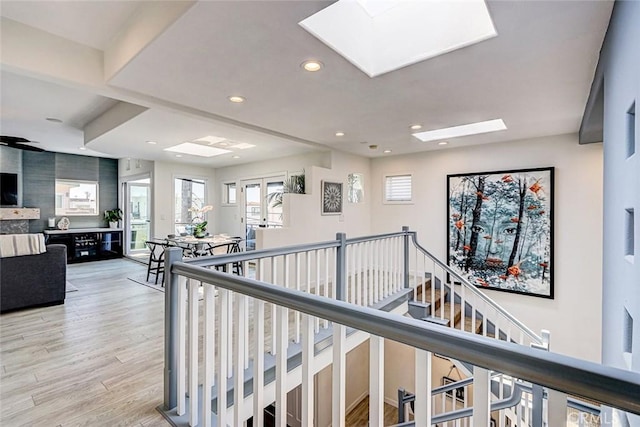 417 23rd St, Manhattan Beach, CA 90266 - hall featuring a skylight, recessed lighting, healthy amount of natural light, light wood-style flooring, and an upstairs landing