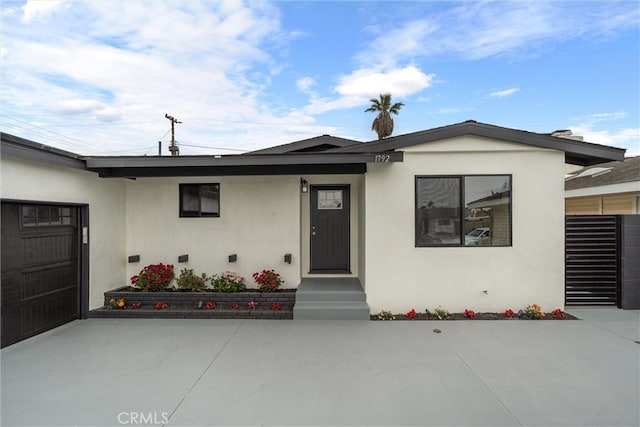 1792 Crestmont Pl, Costa Mesa, CA 92627 - view of front of home featuring stucco siding and an attached garage