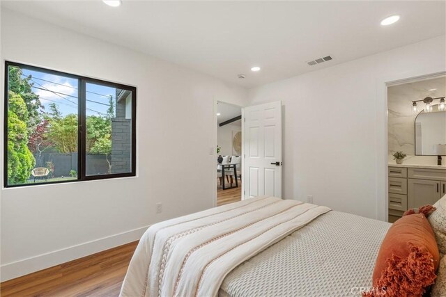 1792 Crestmont Pl, Costa Mesa, CA 92627 - bedroom featuring light wood-style floors, recessed lighting, baseboards, and ensuite bathroom