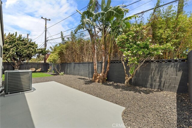 1792 Crestmont Pl, Costa Mesa, CA 92627 - fenced backyard featuring a patio and cooling unit