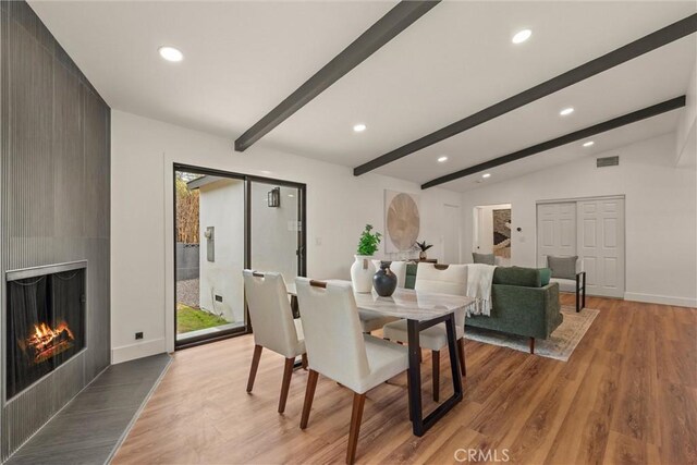 1792 Crestmont Pl, Costa Mesa, CA 92627 - dining area featuring wood finished floors, recessed lighting, a large fireplace, and baseboards