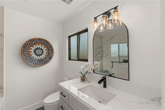 1792 Crestmont Pl, Costa Mesa, CA 92627 - full bath with vanity, a marble finish shower, toilet, and healthy amount of natural light