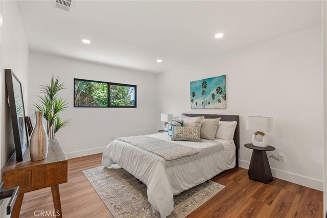 1792 Crestmont Pl, Costa Mesa, CA 92627 - bedroom featuring baseboards, wood finished floors, and recessed lighting