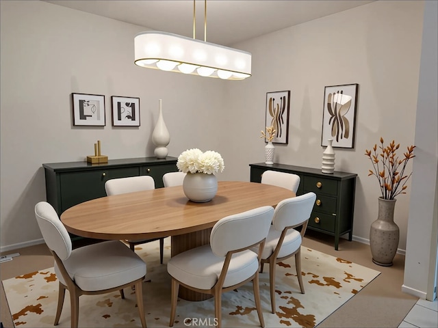 700 S Lake Ave Unit 305, Pasadena, CA 91106 - dining room featuring baseboards