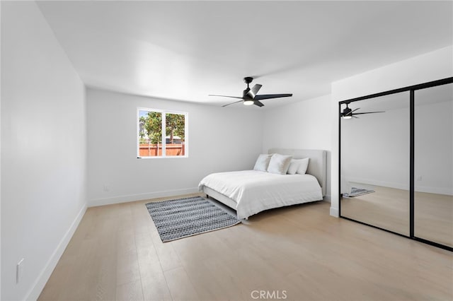1005 E Cruces St, Wilmington, CA 90744 - bedroom with wood finished floors, ceiling fan, and baseboards