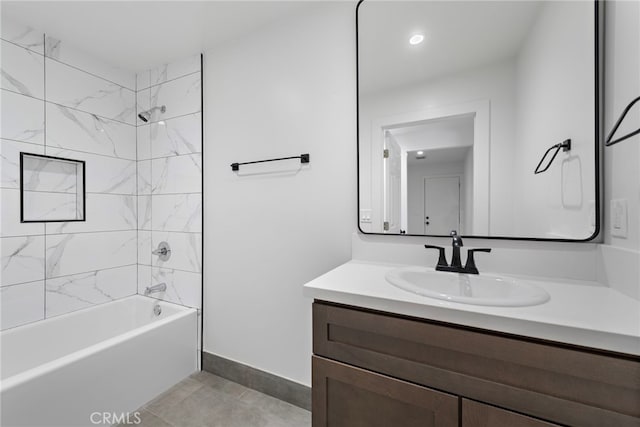 1005 E Cruces St, Wilmington, CA 90744 - bathroom with baseboards, vanity, bathing tub / shower combination, and tile patterned flooring