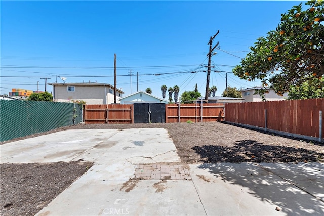 1005 E Cruces St, Wilmington, CA 90744 - fenced backyard with a patio area