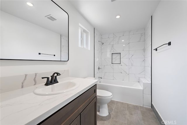 1005 E Cruces St, Wilmington, CA 90744 - bathroom with vanity, toilet, tub / shower combination, and recessed lighting