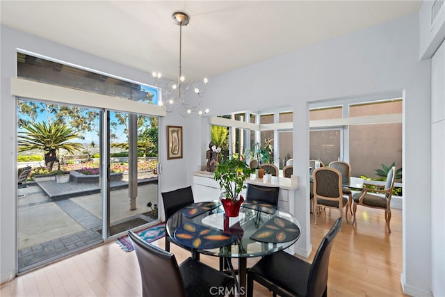 30252 Sonrisa Ln, Laguna Niguel, CA 92677 - dining area with wood finished floors and a chandelier