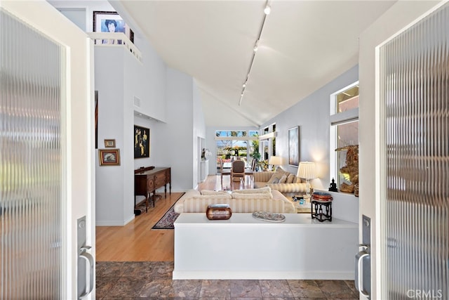 30252 Sonrisa Ln, Laguna Niguel, CA 92677 - kitchen with rail lighting, high vaulted ceiling, and baseboards