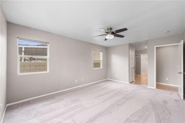 3057 Kilt Ct, Lancaster, CA 93535 - unfurnished bedroom featuring carpet flooring, baseboards, and ceiling fan