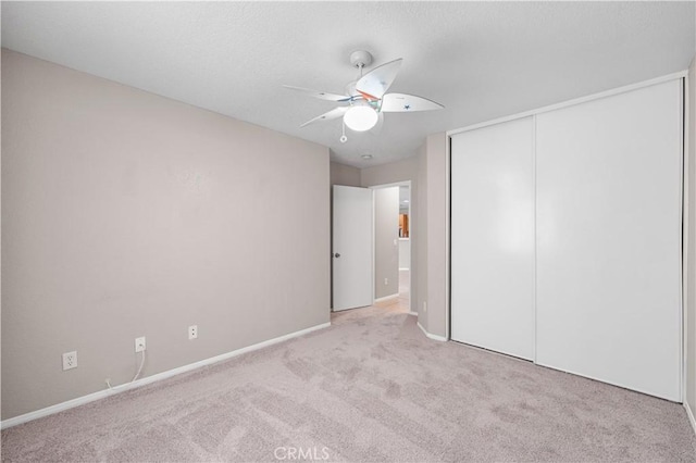 3057 Kilt Ct, Lancaster, CA 93535 - unfurnished bedroom with carpet floors, baseboards, a closet, and ceiling fan