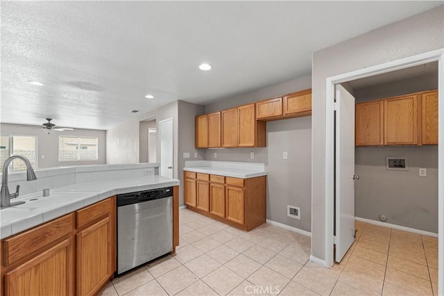 3057 Kilt Ct, Lancaster, CA 93535 - kitchen featuring dishwasher, ceiling fan, light tile patterned floors, recessed lighting, and baseboards