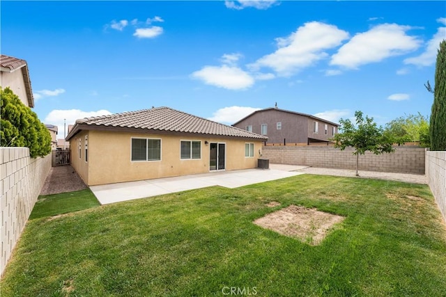 3057 Kilt Ct, Lancaster, CA 93535 - back of property featuring a tiled roof, stucco siding, a patio, and central AC