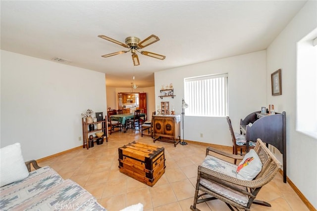 5131 Cygnet Rd A-B, Unit A-B Phelan, CA 92371 - living area featuring a ceiling fan, light tile patterned floors, and baseboards