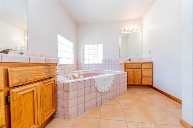 5131 Cygnet Rd A-B, Unit A-B Phelan, CA 92371 - bathroom with two vanities, a garden tub, and tile patterned flooring