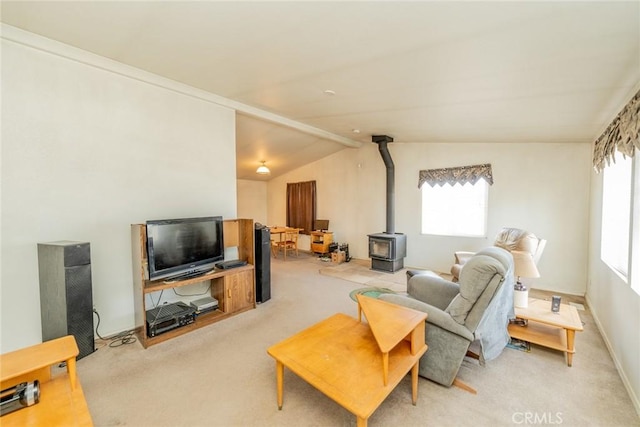 5131 Cygnet Rd A-B, Unit A-B Phelan, CA 92371 - living area featuring a wood stove, light colored carpet, and lofted ceiling