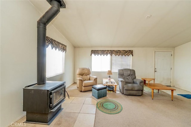 5131 Cygnet Rd A-B, Unit A-B Phelan, CA 92371 - living room featuring a wood stove, light colored carpet, and lofted ceiling
