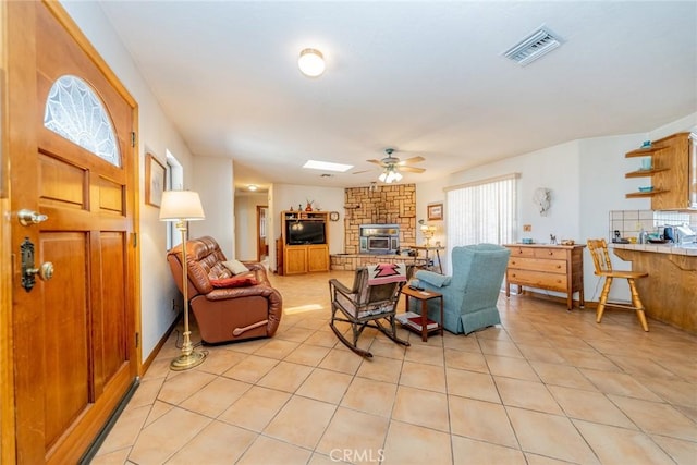 5131 Cygnet Rd A-B, Unit A-B Phelan, CA 92371 - living room featuring light tile patterned floors, a ceiling fan, and a skylight