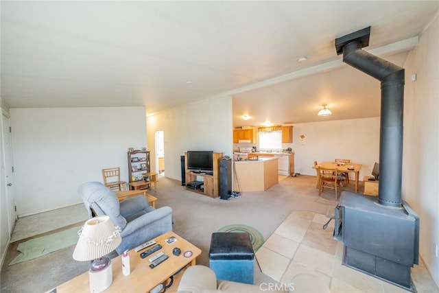5131 Cygnet Rd A-B, Unit A-B Phelan, CA 92371 - living room featuring a wood stove and light carpet