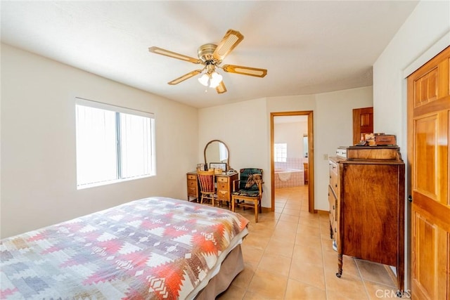 5131 Cygnet Rd A-B, Unit A-B Phelan, CA 92371 - bedroom with multiple windows, light tile patterned floors, ceiling fan, and connected bathroom