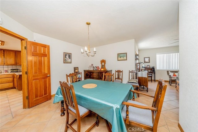 5131 Cygnet Rd A-B, Unit A-B Phelan, CA 92371 - dining room featuring light tile patterned floors and a chandelier