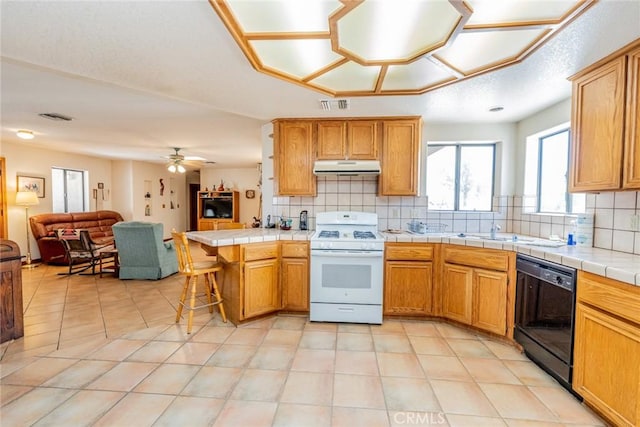 5131 Cygnet Rd A-B, Unit A-B Phelan, CA 92371 - kitchen featuring white range with gas cooktop, dishwasher, under cabinet range hood, open floor plan, and tasteful backsplash