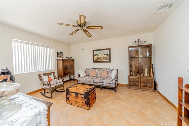 5131 Cygnet Rd A-B, Unit A-B Phelan, CA 92371 - living area featuring a ceiling fan, light tile patterned floors, and baseboards