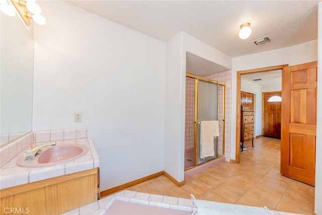 5131 Cygnet Rd A-B, Unit A-B Phelan, CA 92371 - bathroom featuring a stall shower, vanity, tile patterned flooring, and baseboards