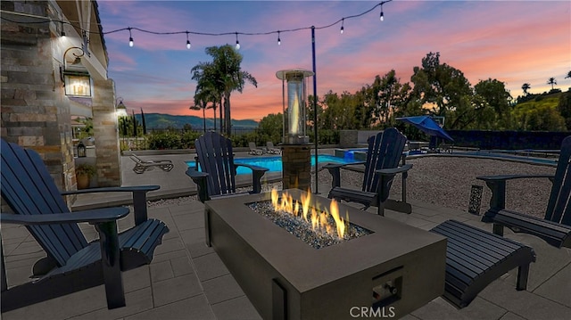 30927 Steeplechase Dr, San Juan Capistrano, CA 92675 - view of patio / terrace featuring an outdoor fire pit