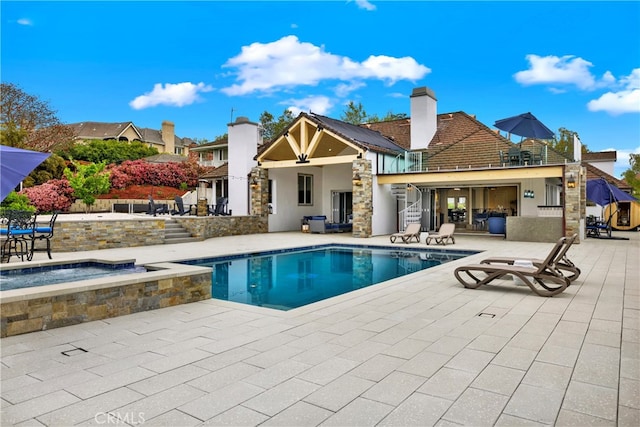 30927 Steeplechase Dr, San Juan Capistrano, CA 92675 - view of pool with a patio area and a pool with connected hot tub