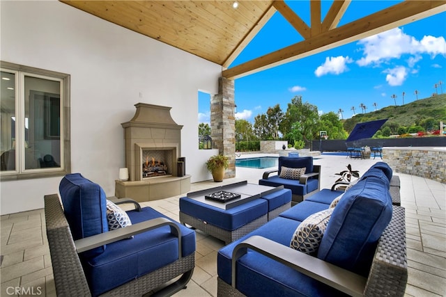 30927 Steeplechase Dr, San Juan Capistrano, CA 92675 - view of patio featuring an outdoor living space with a fireplace and a pool with connected hot tub