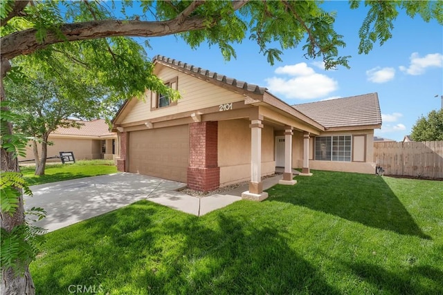 2101 Thomas Dr, Lancaster, CA 93535 - view of front of property with a tiled roof, a garage, stucco siding, and driveway