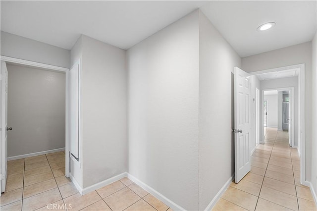 2101 Thomas Dr, Lancaster, CA 93535 - hall with light tile patterned floors and baseboards
