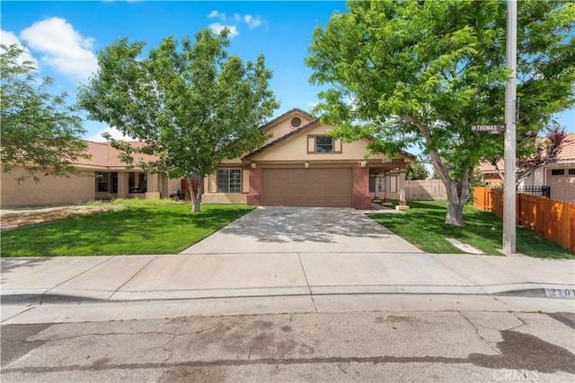 2101 Thomas Dr, Lancaster, CA 93535 - view of front of house with driveway and brick siding