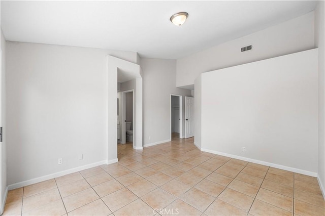 2101 Thomas Dr, Lancaster, CA 93535 - unfurnished room with light tile patterned flooring and baseboards