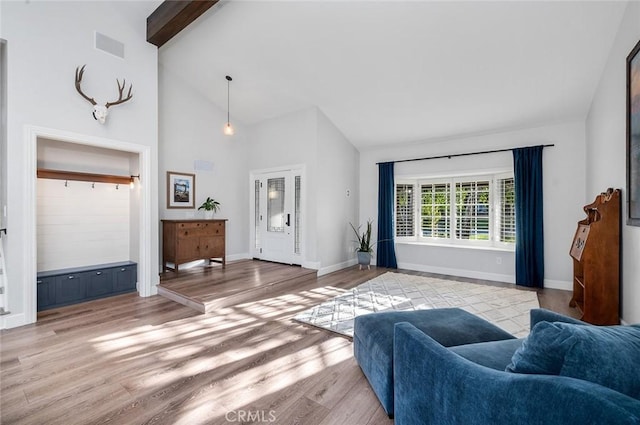 2244 N 1st Ave, Upland, CA 91784 - living room featuring light wood-style flooring, high vaulted ceiling, and beam ceiling